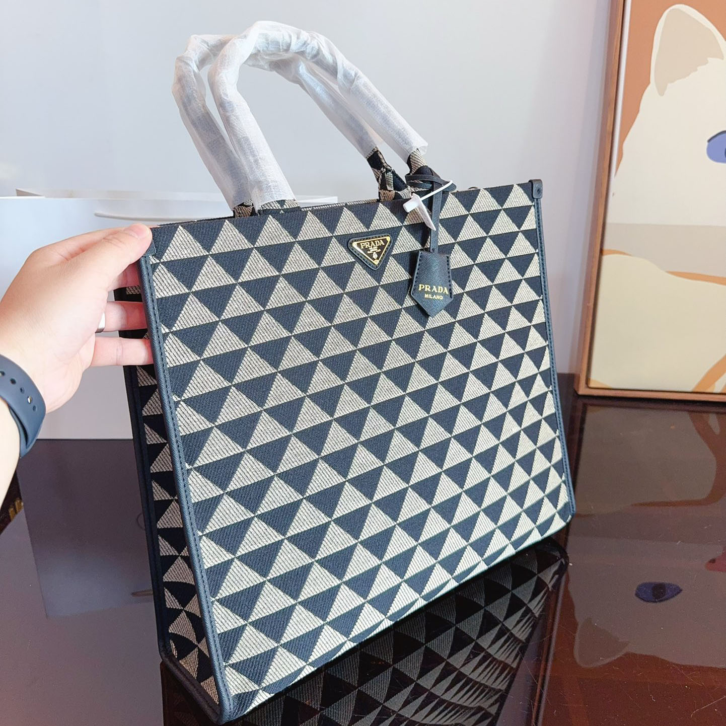 Symbole embroidered fabric handbag