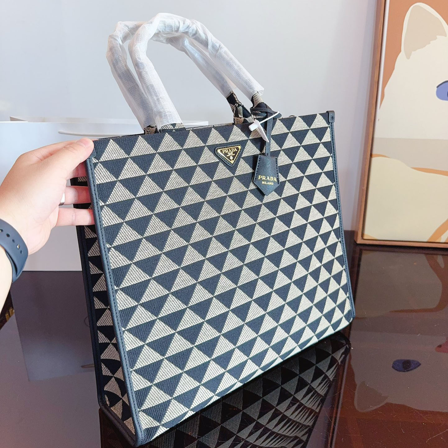 Symbole embroidered fabric handbag