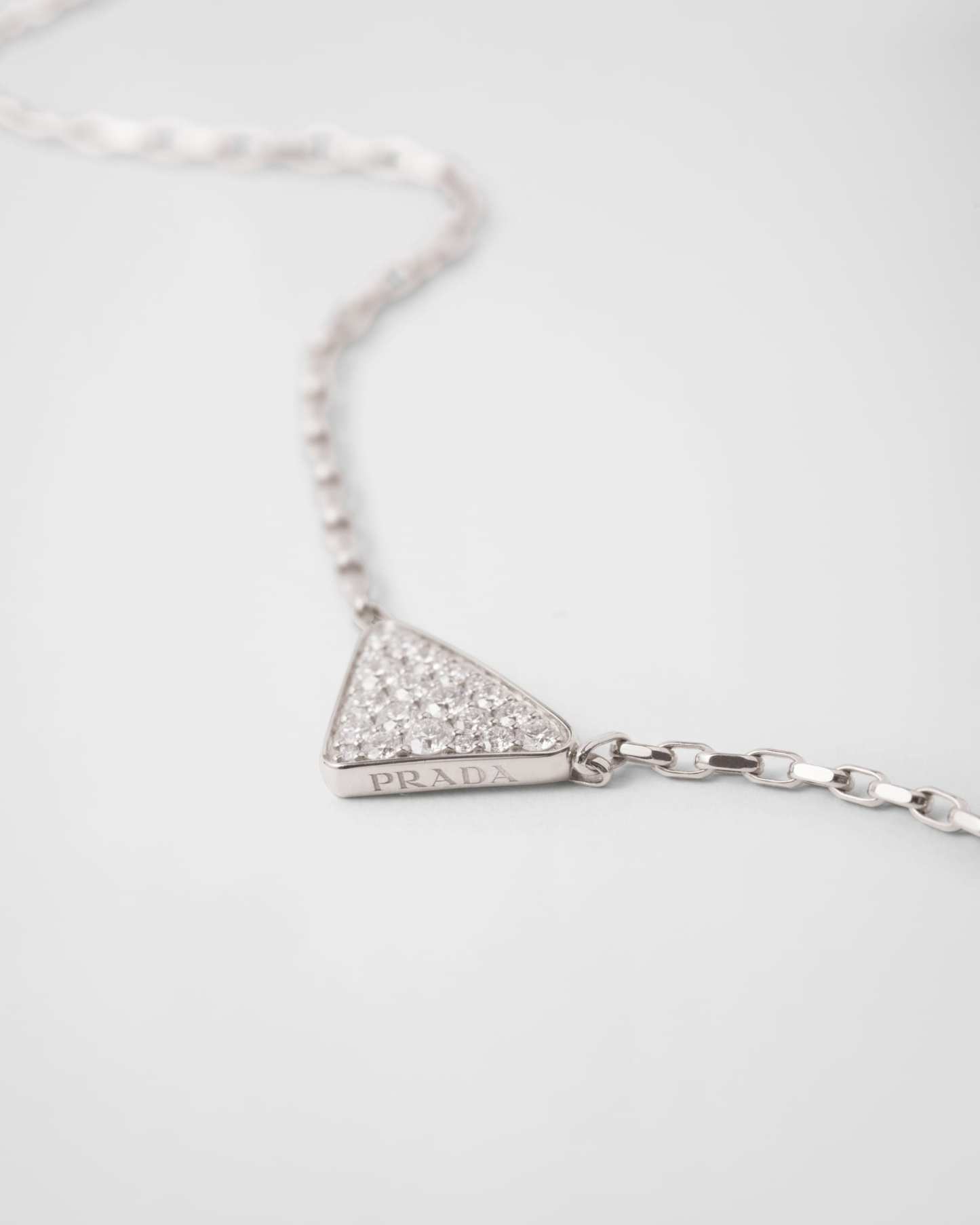 Eternal Gold mini triangle pendant necklace in white gold and diamonds