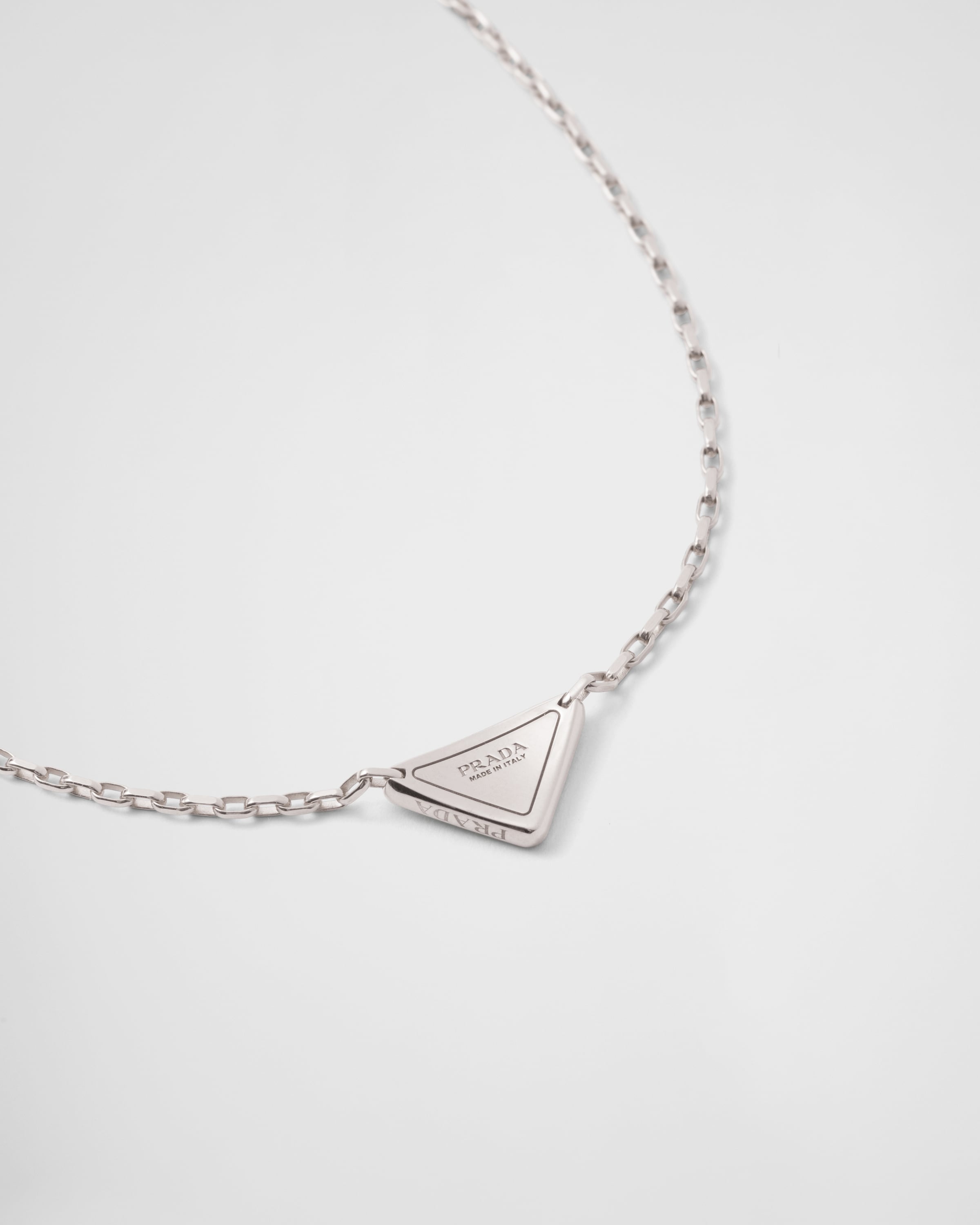 Eternal Gold mini triangle pendant necklace in white gold and diamonds