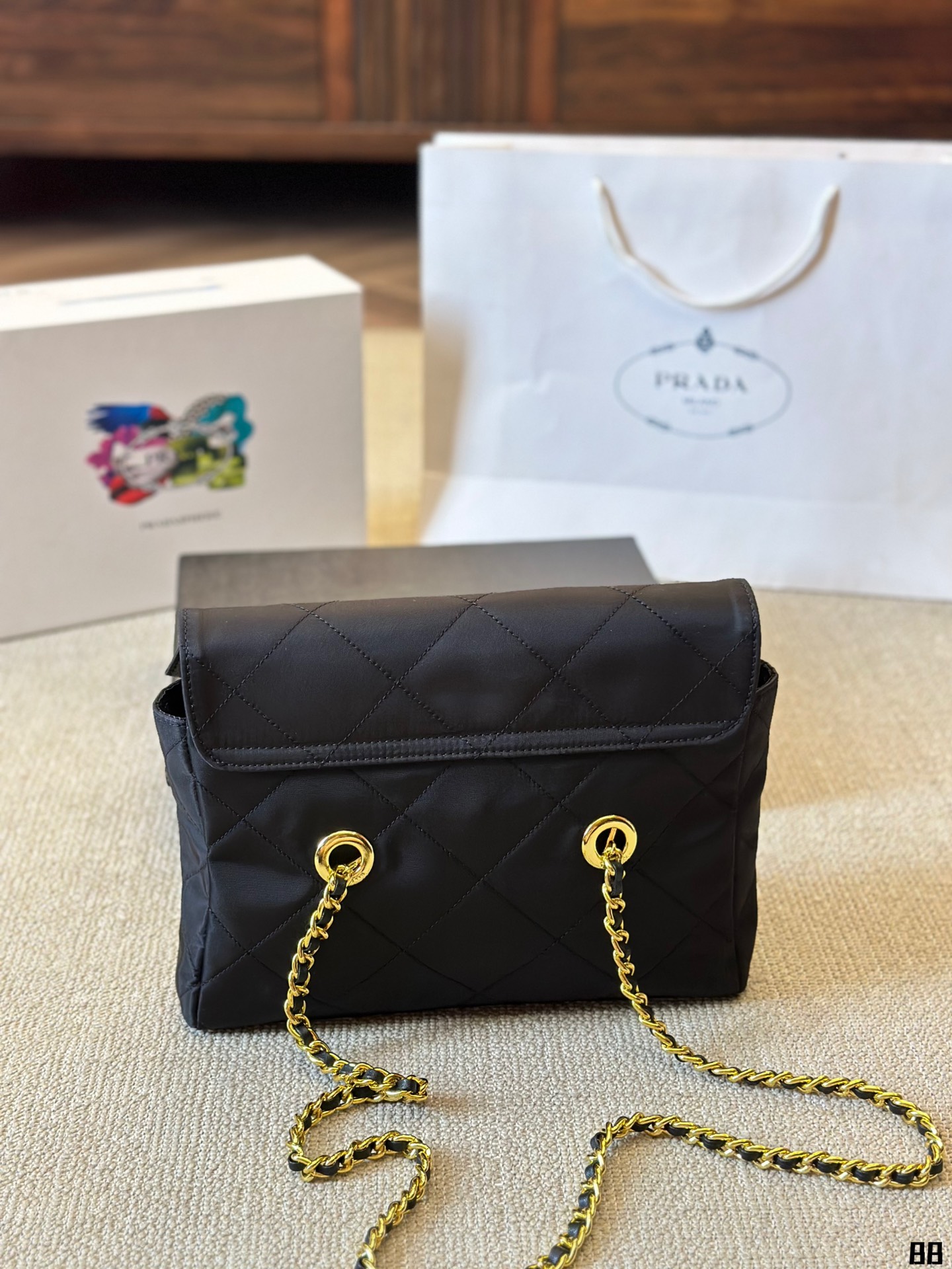 Enamel triangle logo quilted handbag