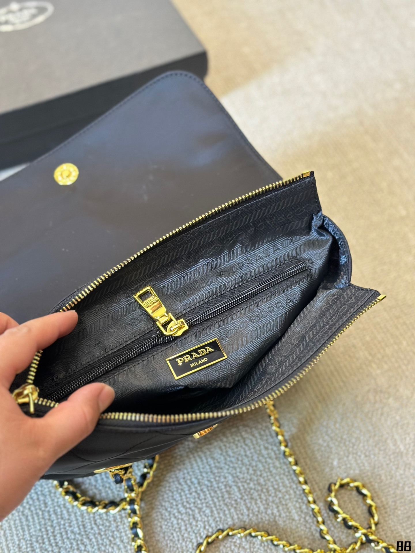 Enamel triangle logo quilted handbag