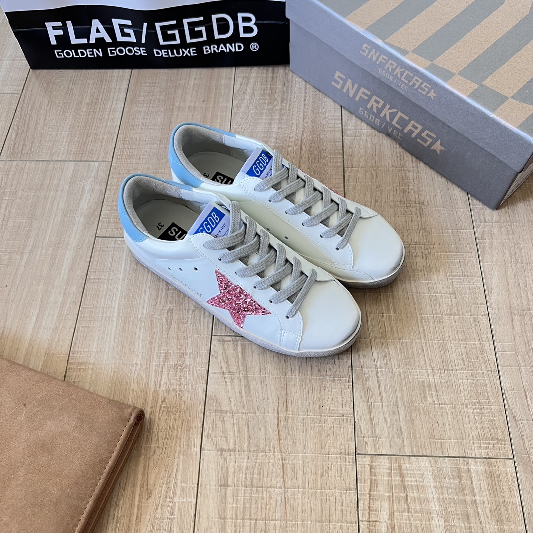 Super-Star Sabot with pink glitter star and suede toe