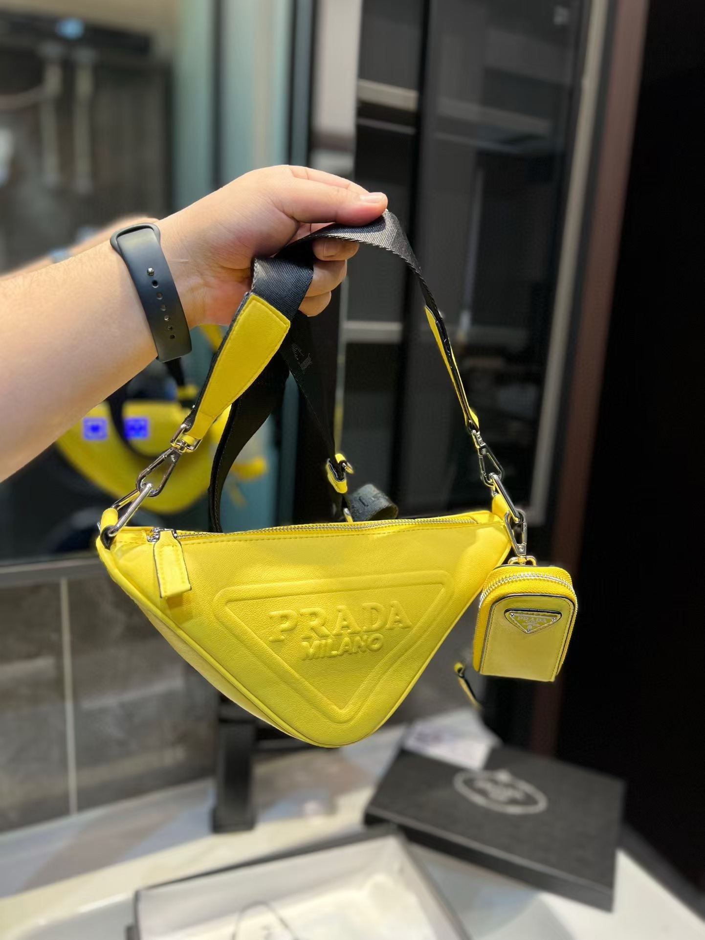 Triangle leather mini-bag