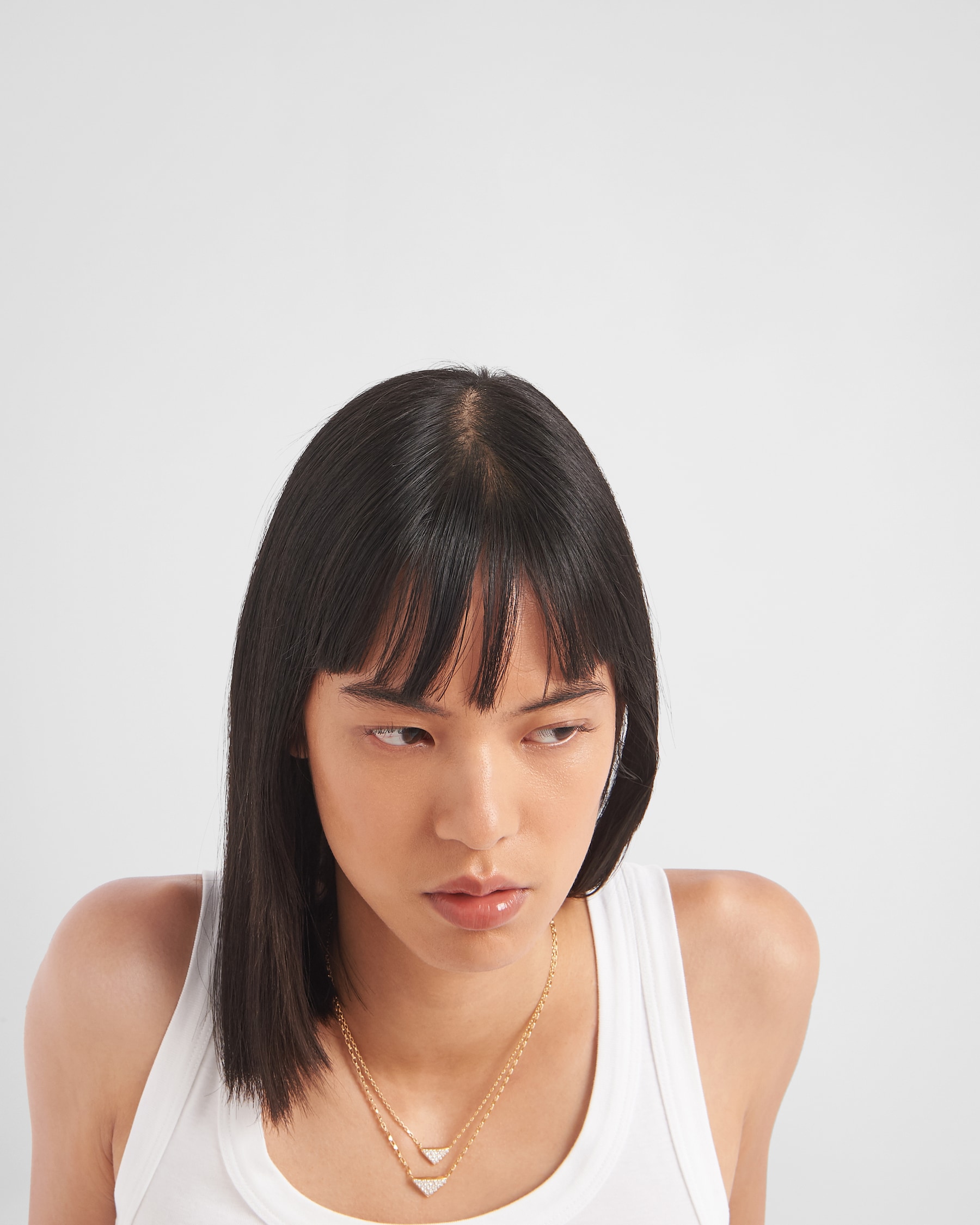 Eternal Gold Eternal mini triangle pendant necklace in yellow gold and diamonds