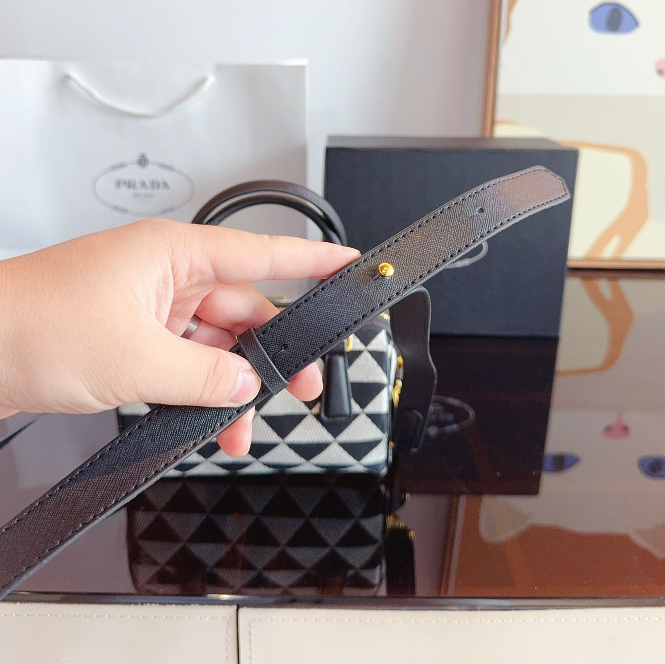 Symbole embroidered fabric top-handle bag