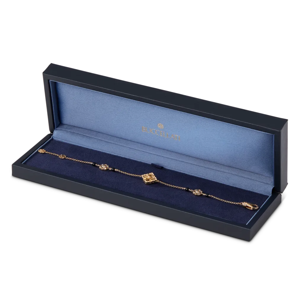 OPERA TULLE YELLOW GOLD BRACELET WITH ONYX LOGO