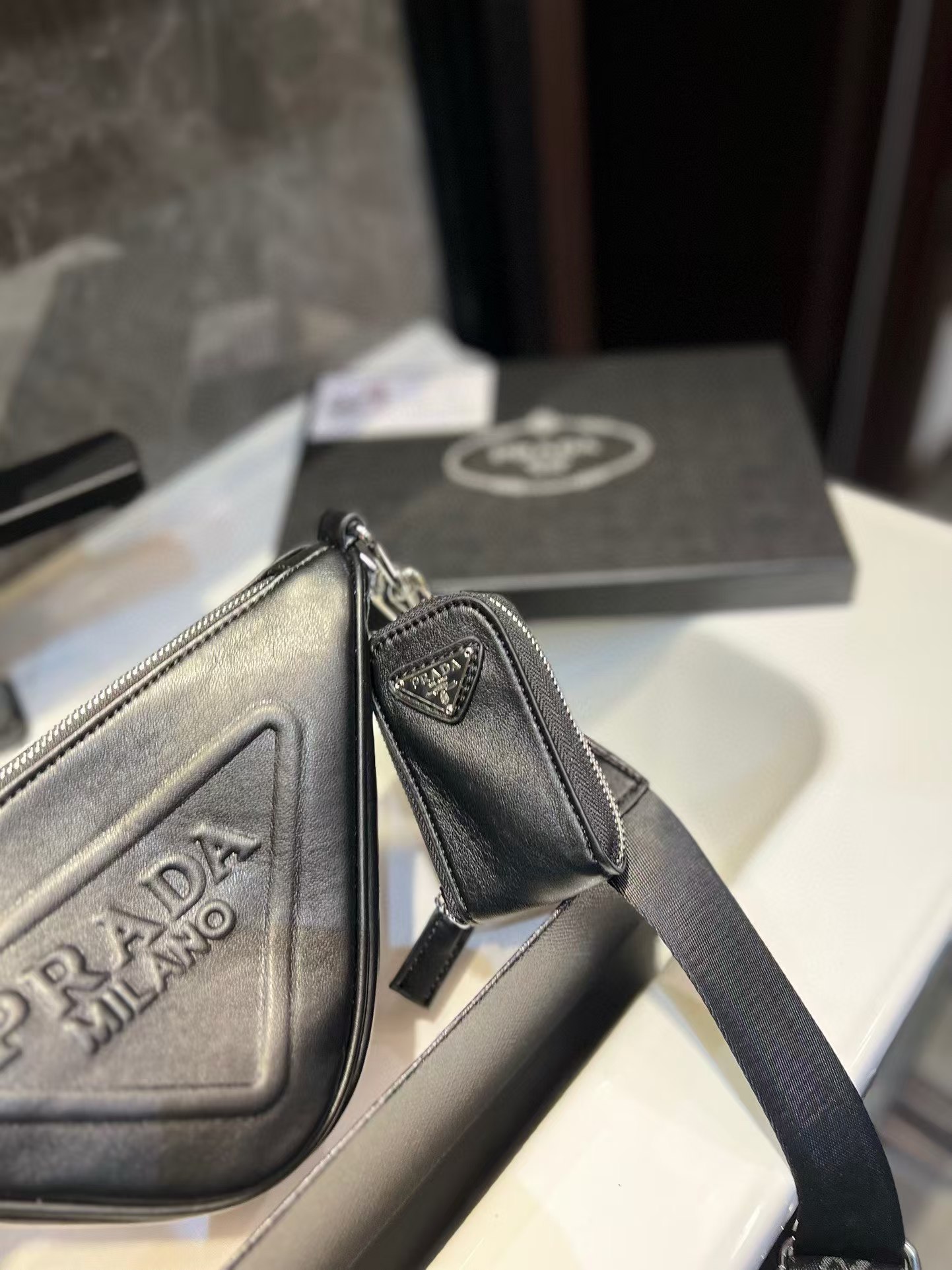 Triangle leather mini-bag