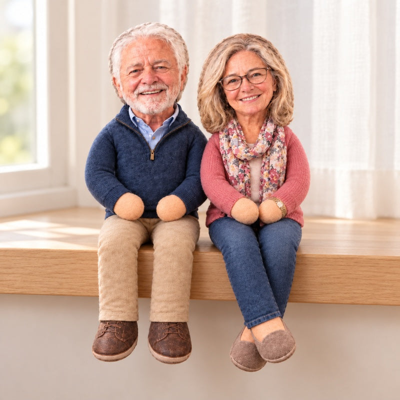 Personalized couple photo dolls on a wooden window ledge
