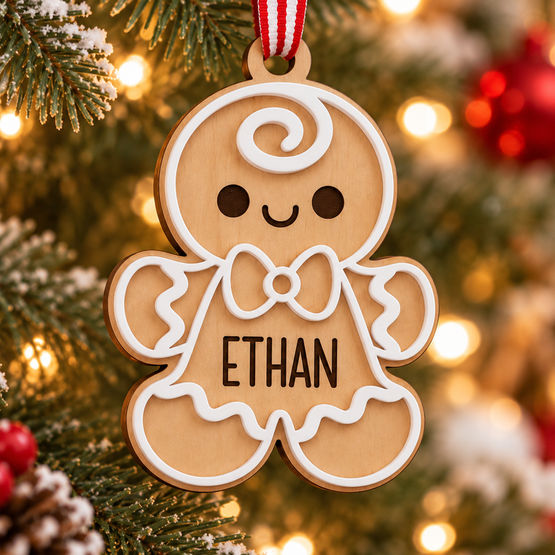 Printed ETHAN name on the front of a wooden gingerbread boy ornament