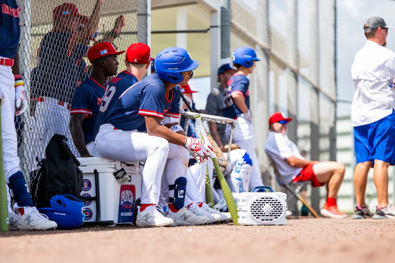Guys playing baseball and listening music from Turtlebox