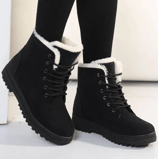 Botas elegantes de mujer hasta el tobillo