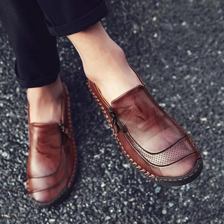 Zapatos de cuero sin cordones con cremallera y costuras a mano para hombre