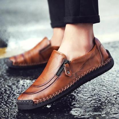 Zapatos de cuero sin cordones con cremallera y costuras a mano para hombre