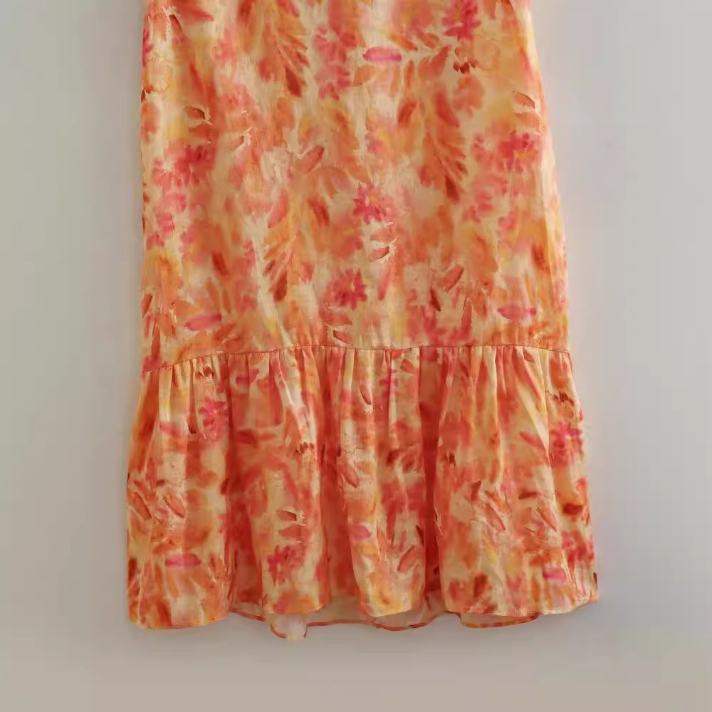 Elegante vestido estampado con volantes