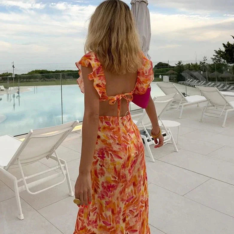 Elegante vestido estampado con volantes