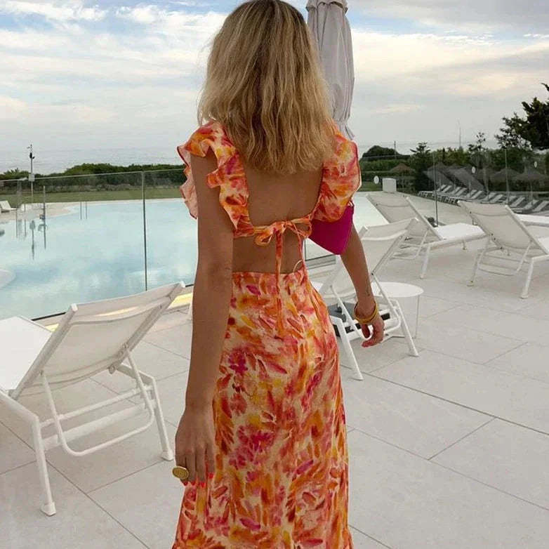 Elegante vestido estampado con volantes
