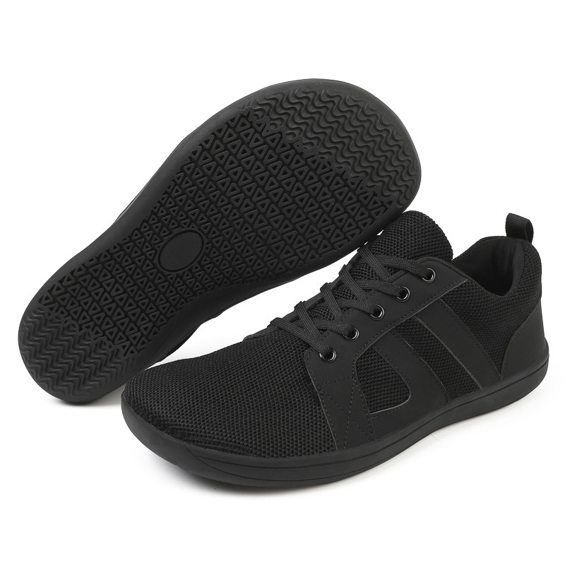 Zapatos de dedos anchos con la suela descalza