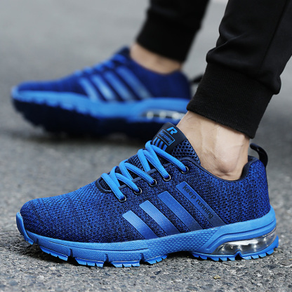Breathable fly knit casual sports air cushion shoes