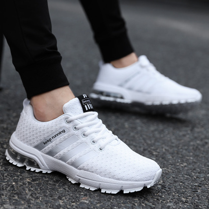 Breathable fly knit casual sports air cushion shoes