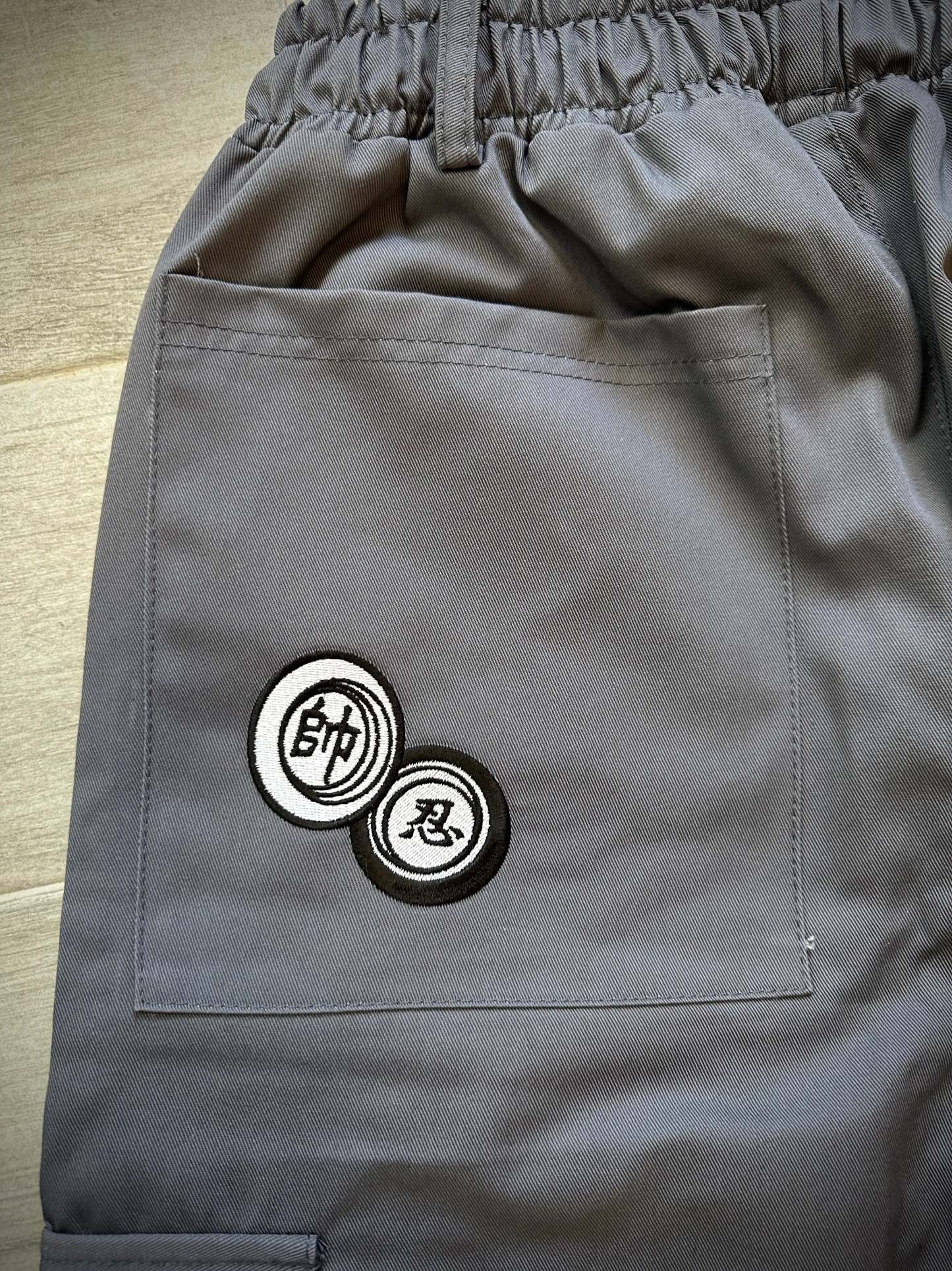NETERO X MERUEM PARACHUTE PANTS