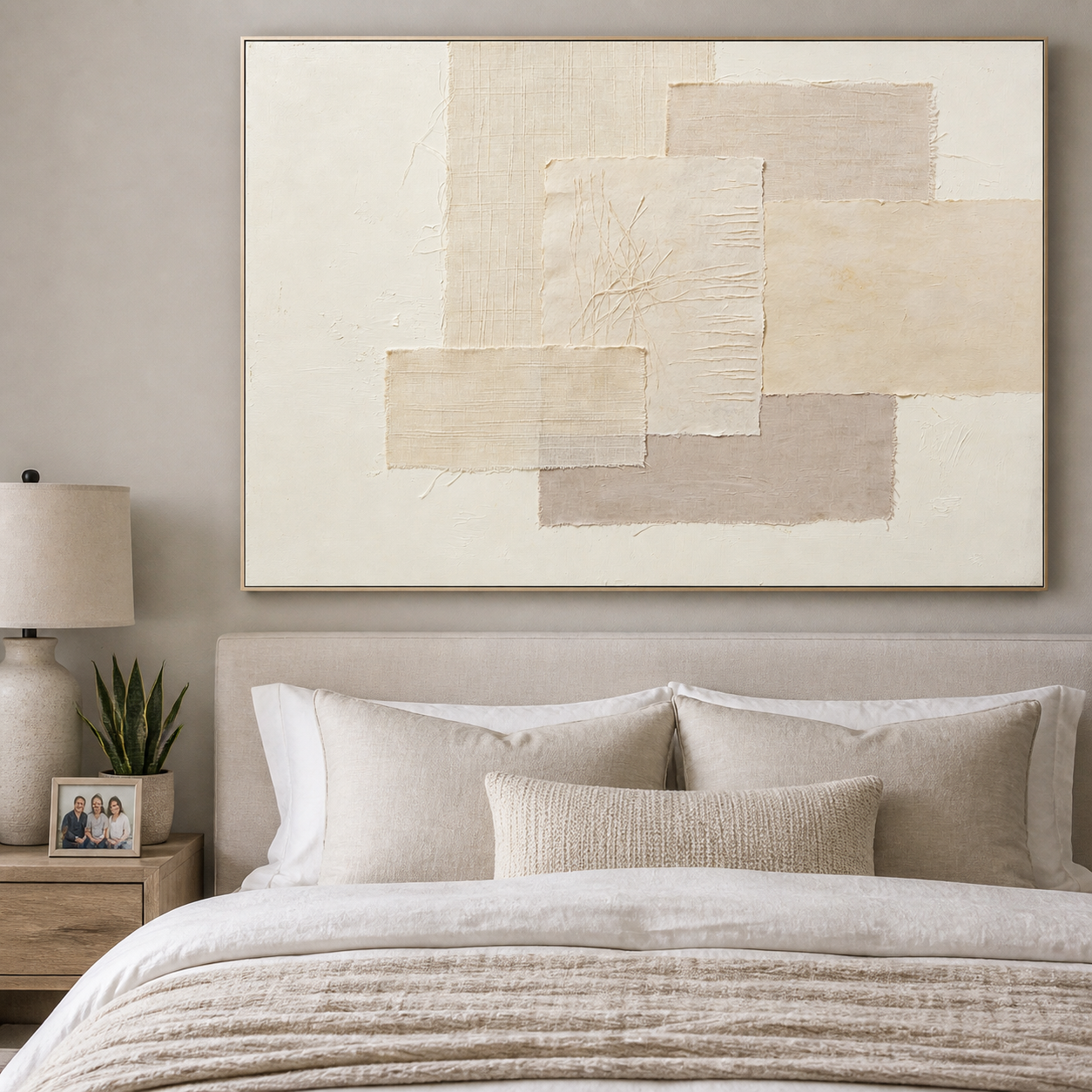Overlapping cream, sand, and taupe rectangles with uneven edges on off-white, shown in a room setting