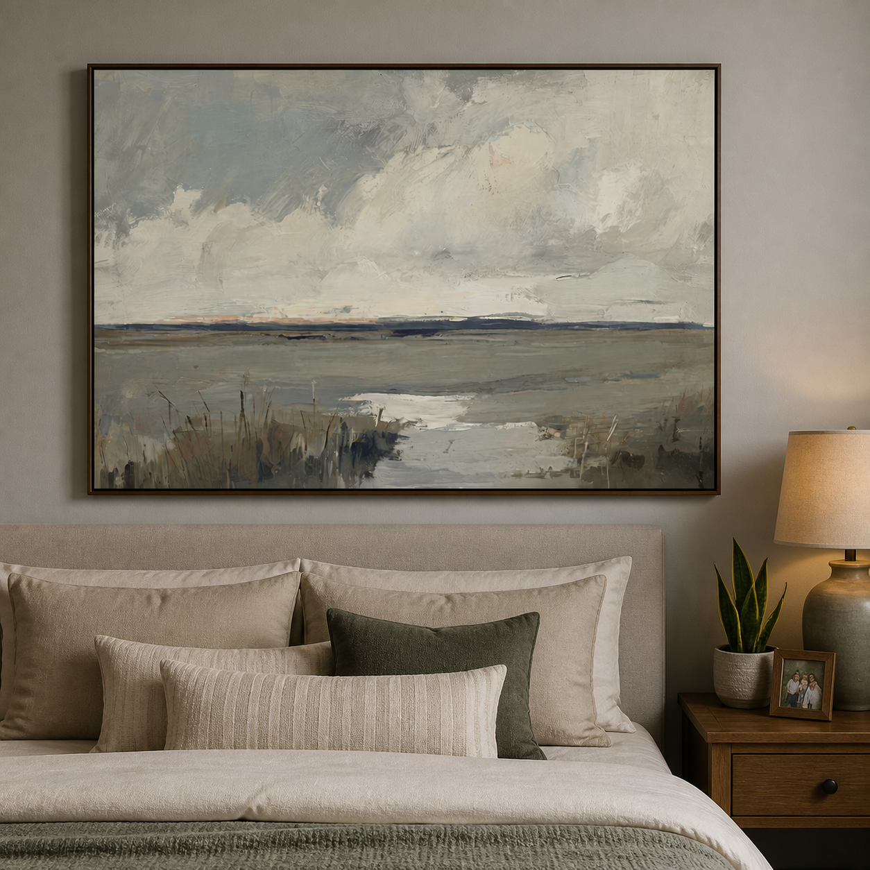 Gray-blue marsh water and reeds beneath broad cream clouds and a distant dark horizon, shown in a room setting