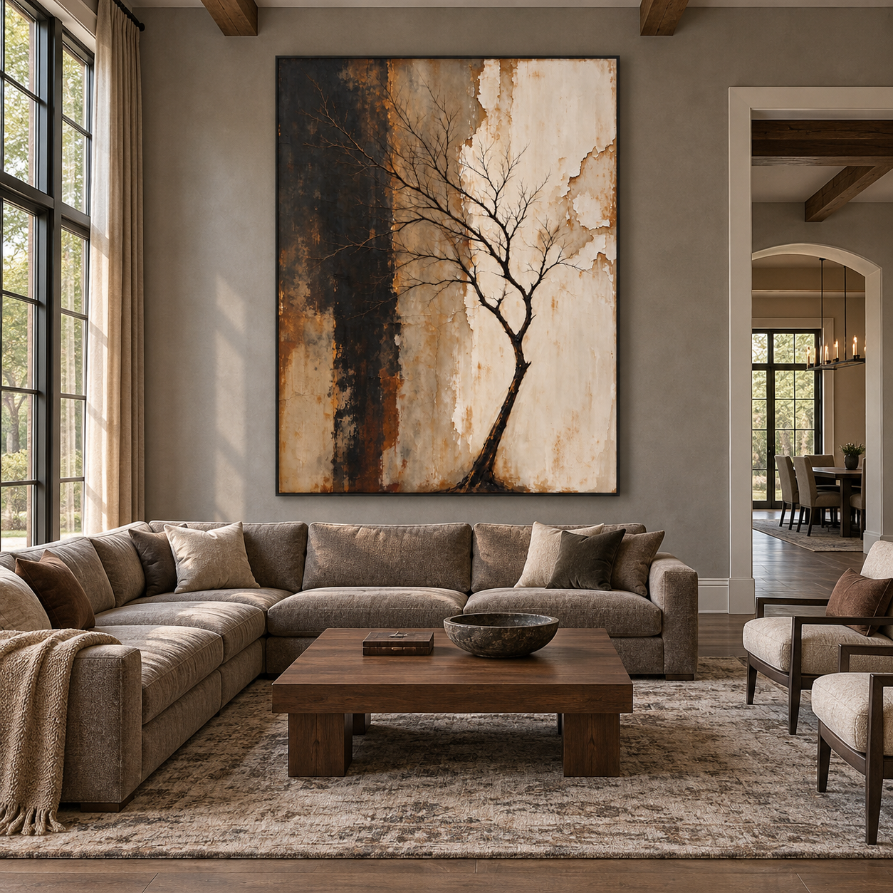 Leaning black bare tree across ochre and ivory beside a broad charcoal field, shown in a room setting