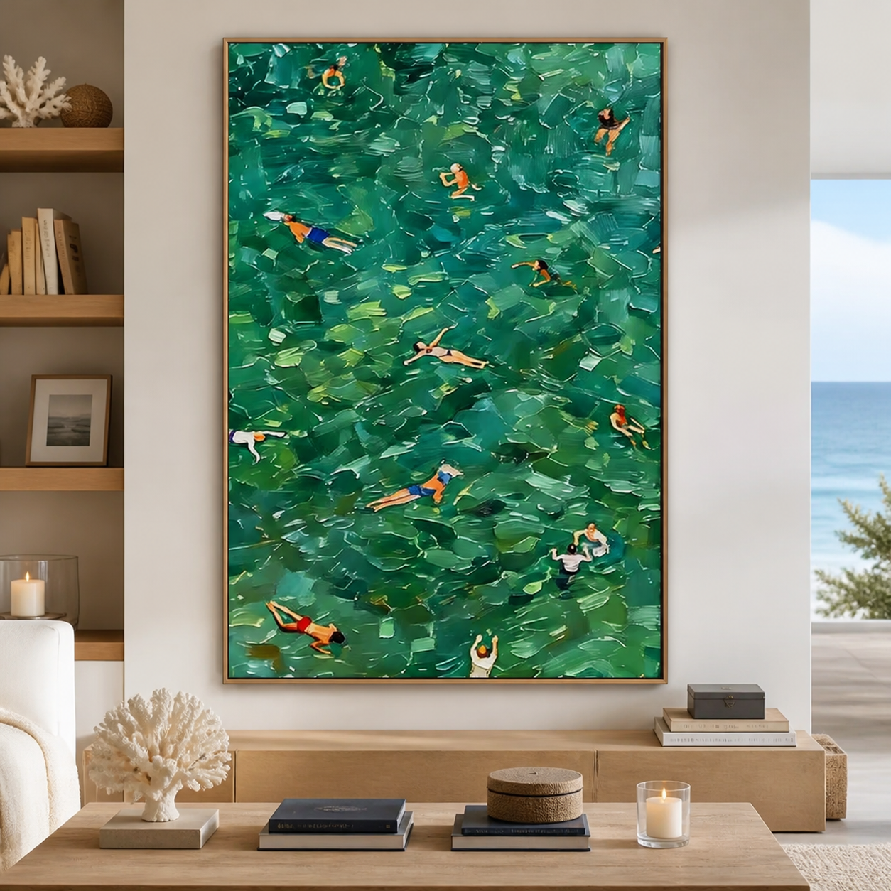 An overhead view of swimmers scattered across emerald green and turquoise water, shown in a room setting
