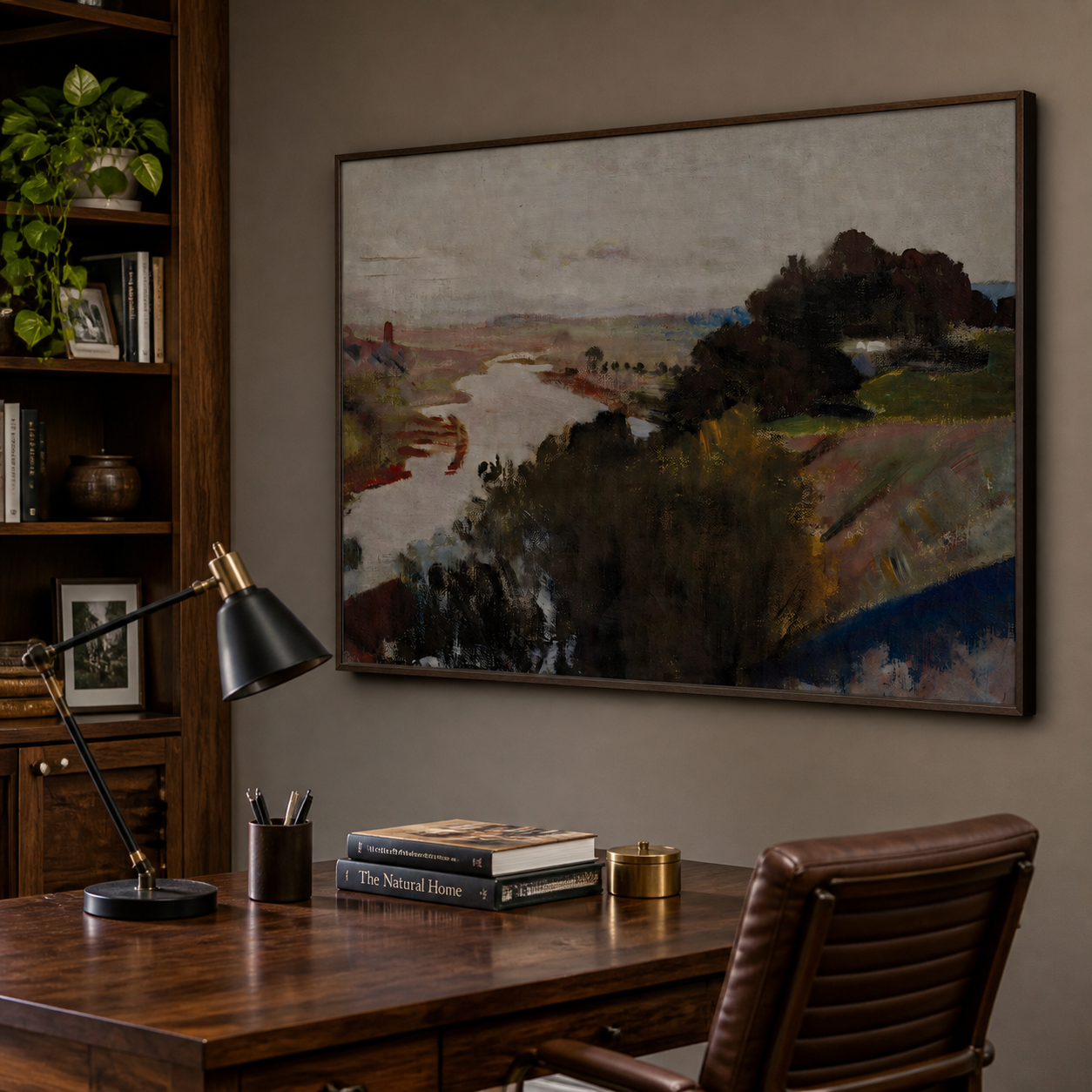 A winding pale river through muted rust and olive countryside with dark trees and a gray sky, shown in a room setting