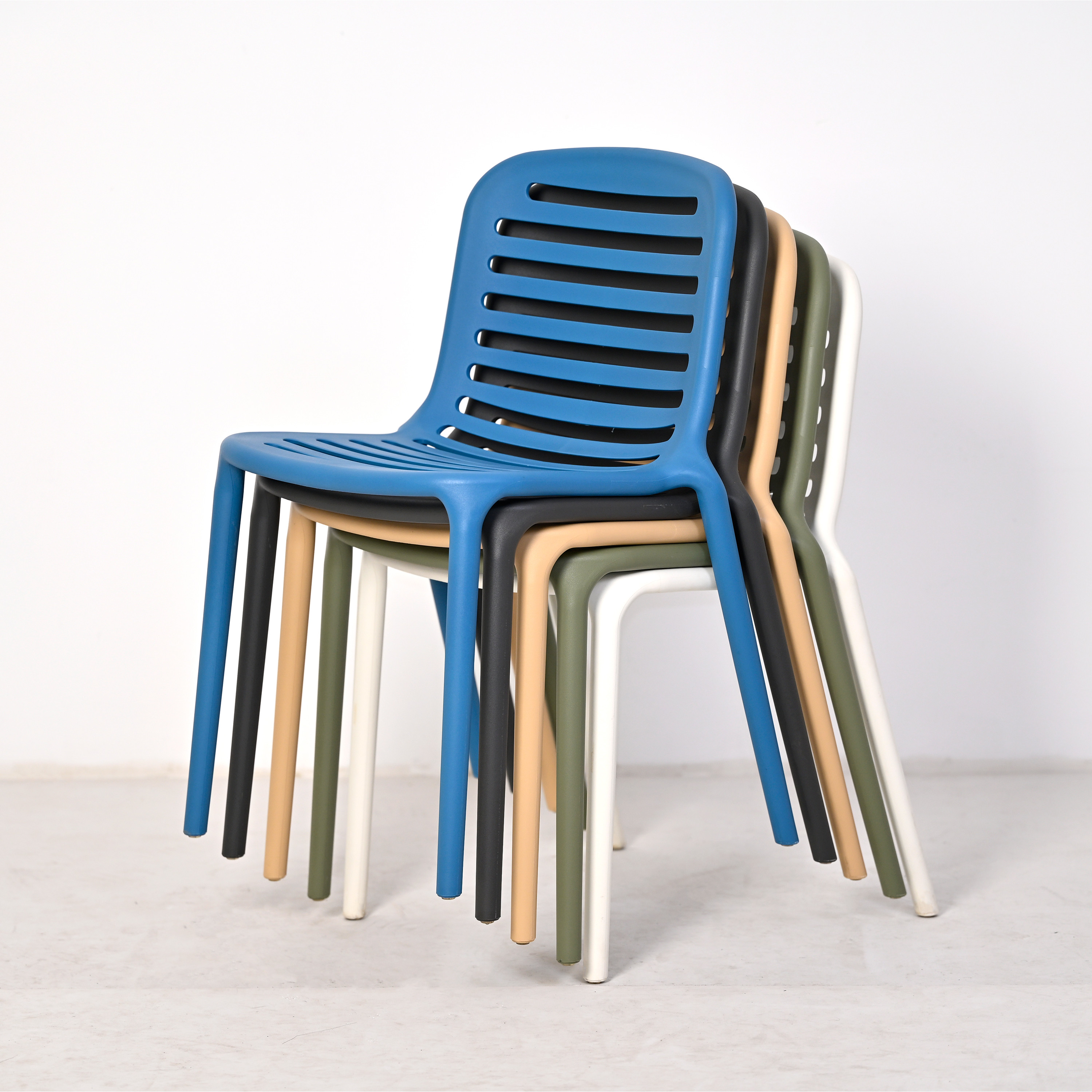 Stackable PP Plastic Chair with Slatted Backrest | Modern Outdoor Dining Chair