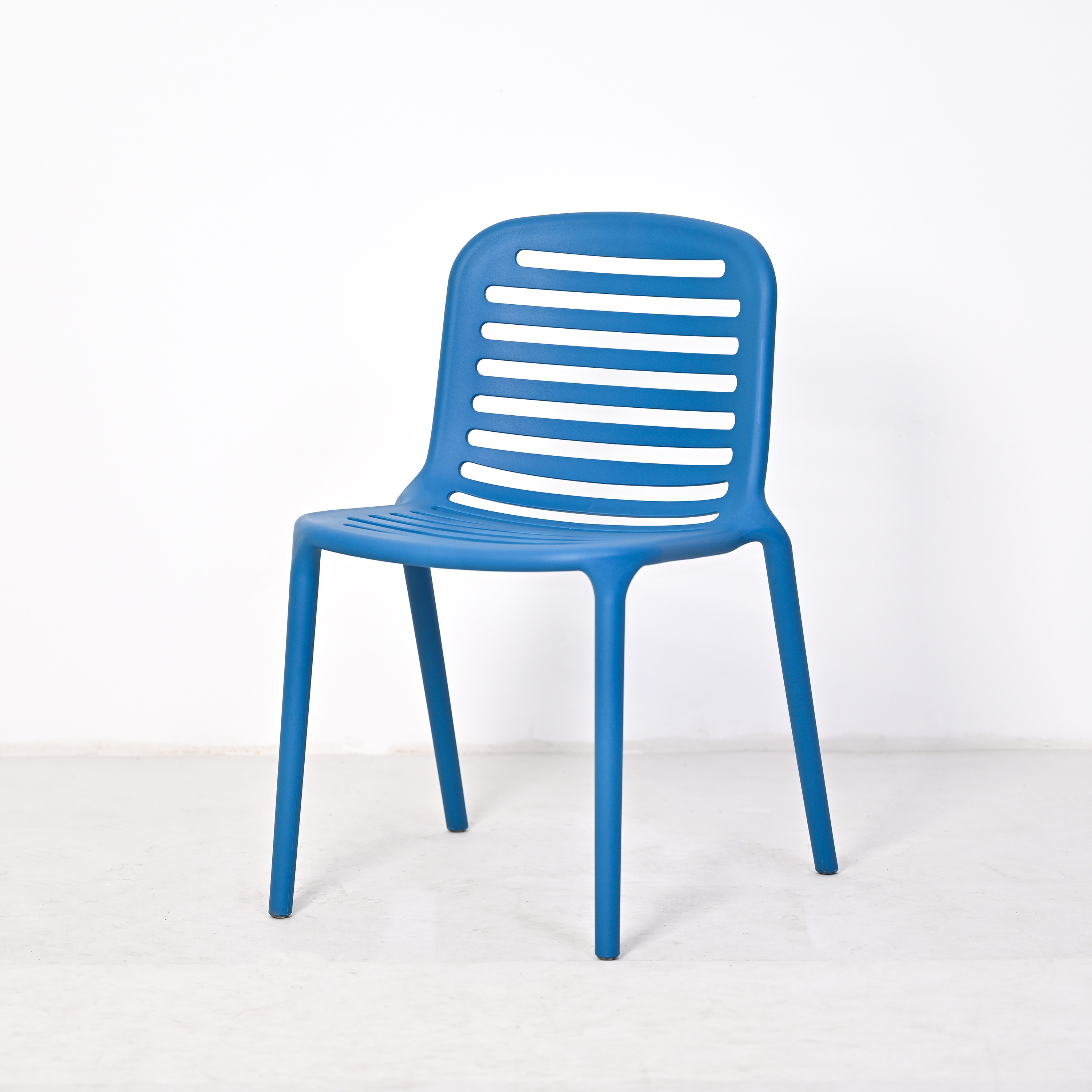 Stackable PP Plastic Chair with Slatted Backrest | Modern Outdoor Dining Chair