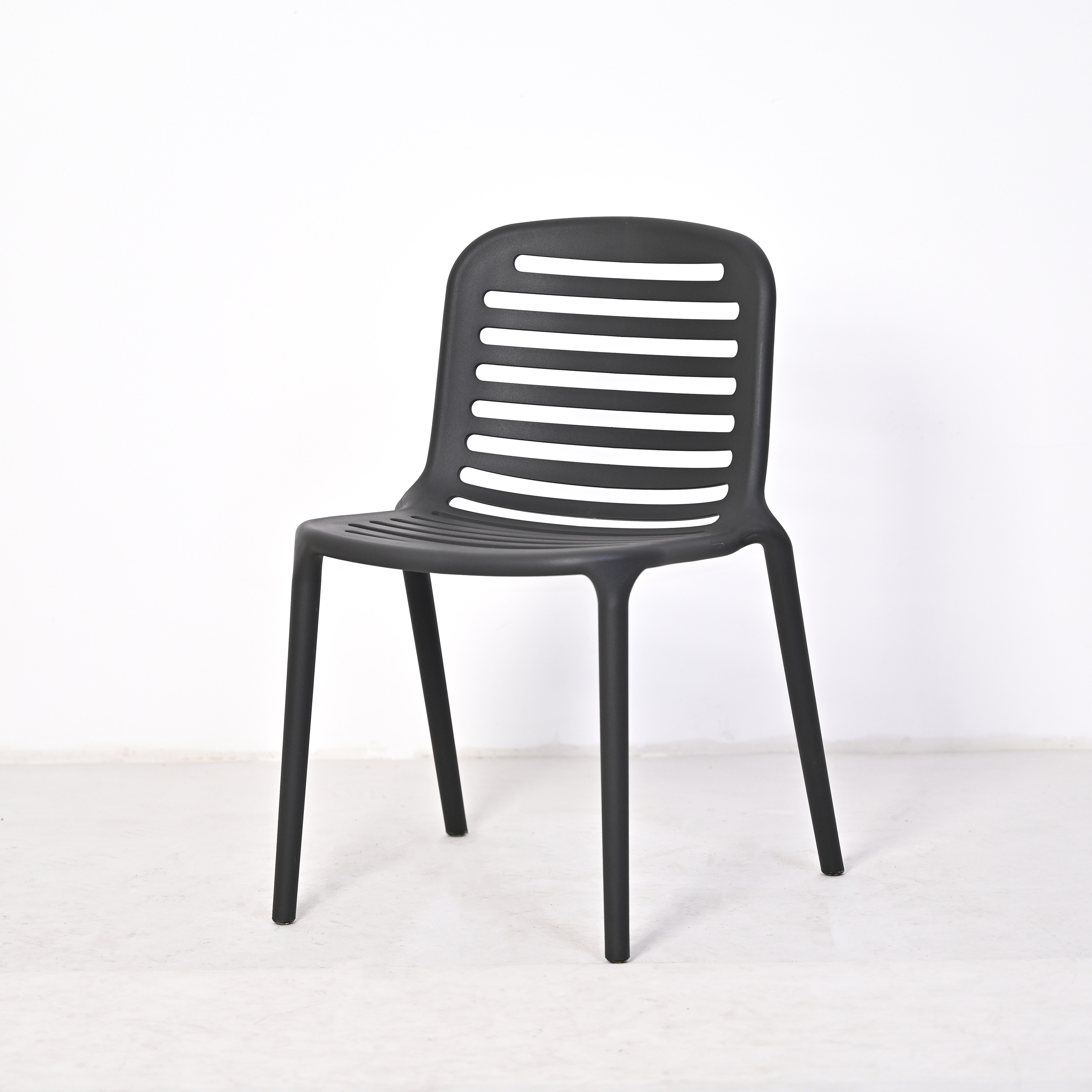 Stackable PP Plastic Chair with Slatted Backrest | Modern Outdoor Dining Chair