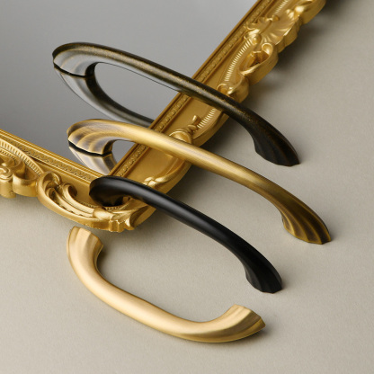 Modern Curved Black and Brass Arc Cabinet Pulls