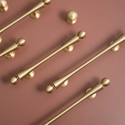 Modern Scroll-Inspired Brass Cabinet Pulls