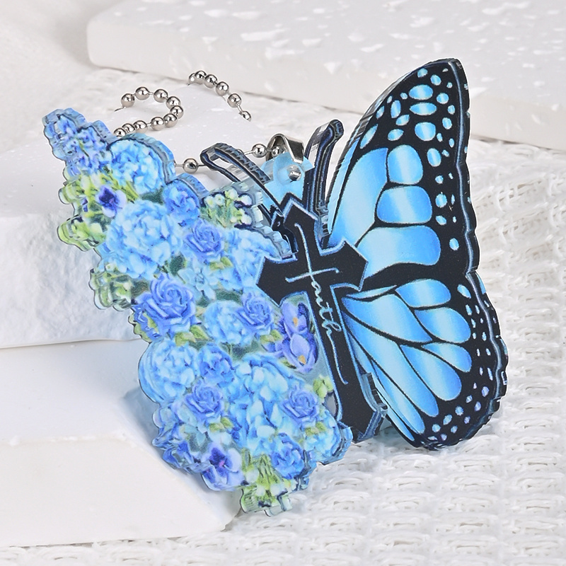 Add a Touch of Elegance to Your Home or Car with this Acrylic Blue Butterfly Flower Jesus Cross Pendant!