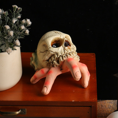 Halloween skull simulation hand