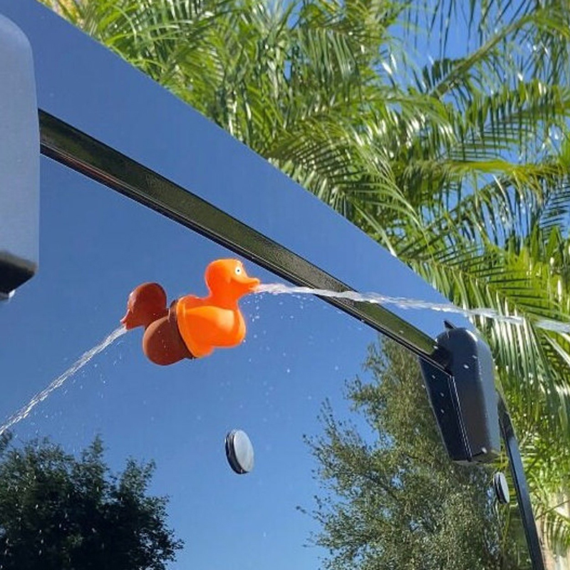 🚗💦 Meet the Ultimate Car Accessory: The Fun Middle Finger Spraying Duck! 🦆💥