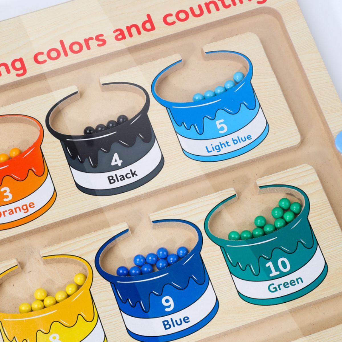 The wooden toy for learning fine motor skills is a magnetic maze designed for colors and numbers, suitable for young children and preschoolers.