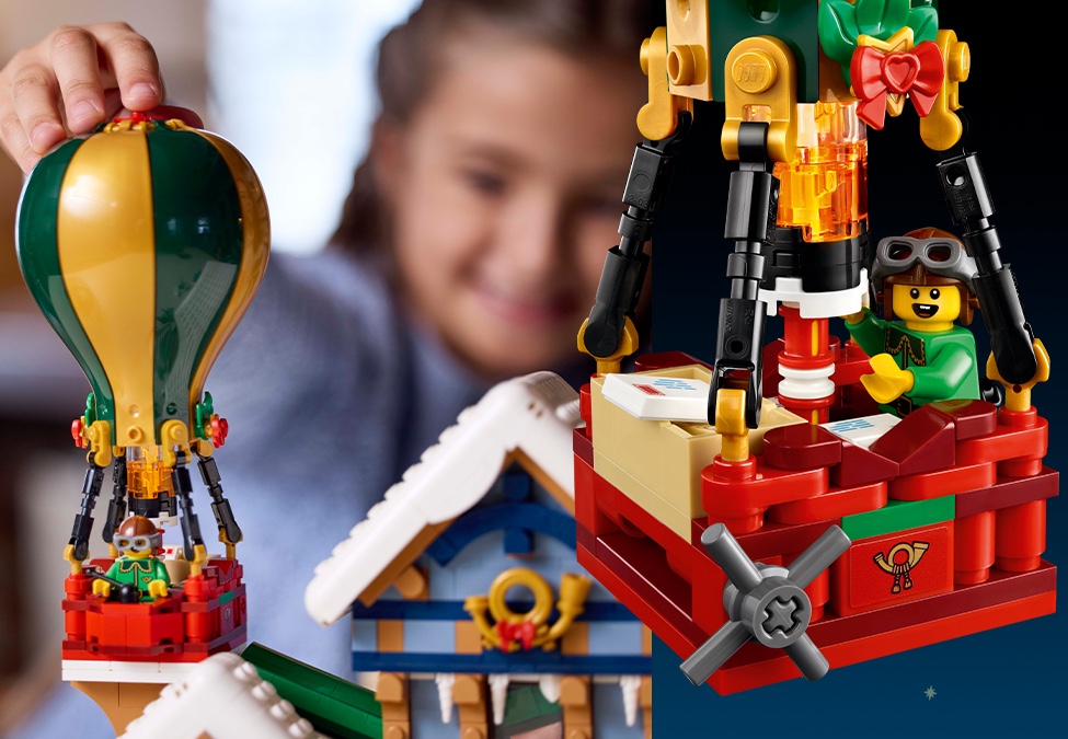 Girl holding LEGO brick-built hot air balloon