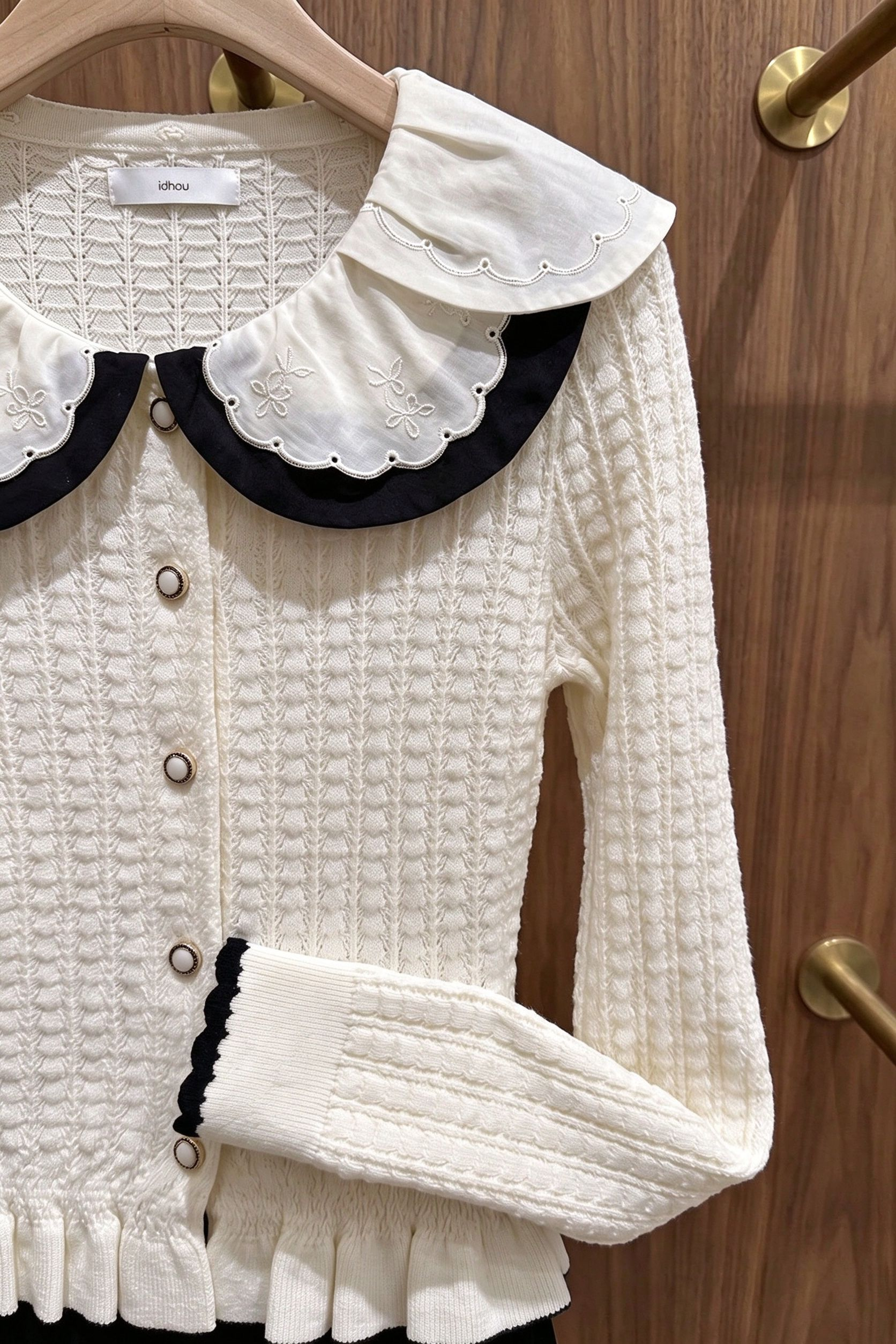 Off-White Textured Knit Fitted Peplum Cardigan