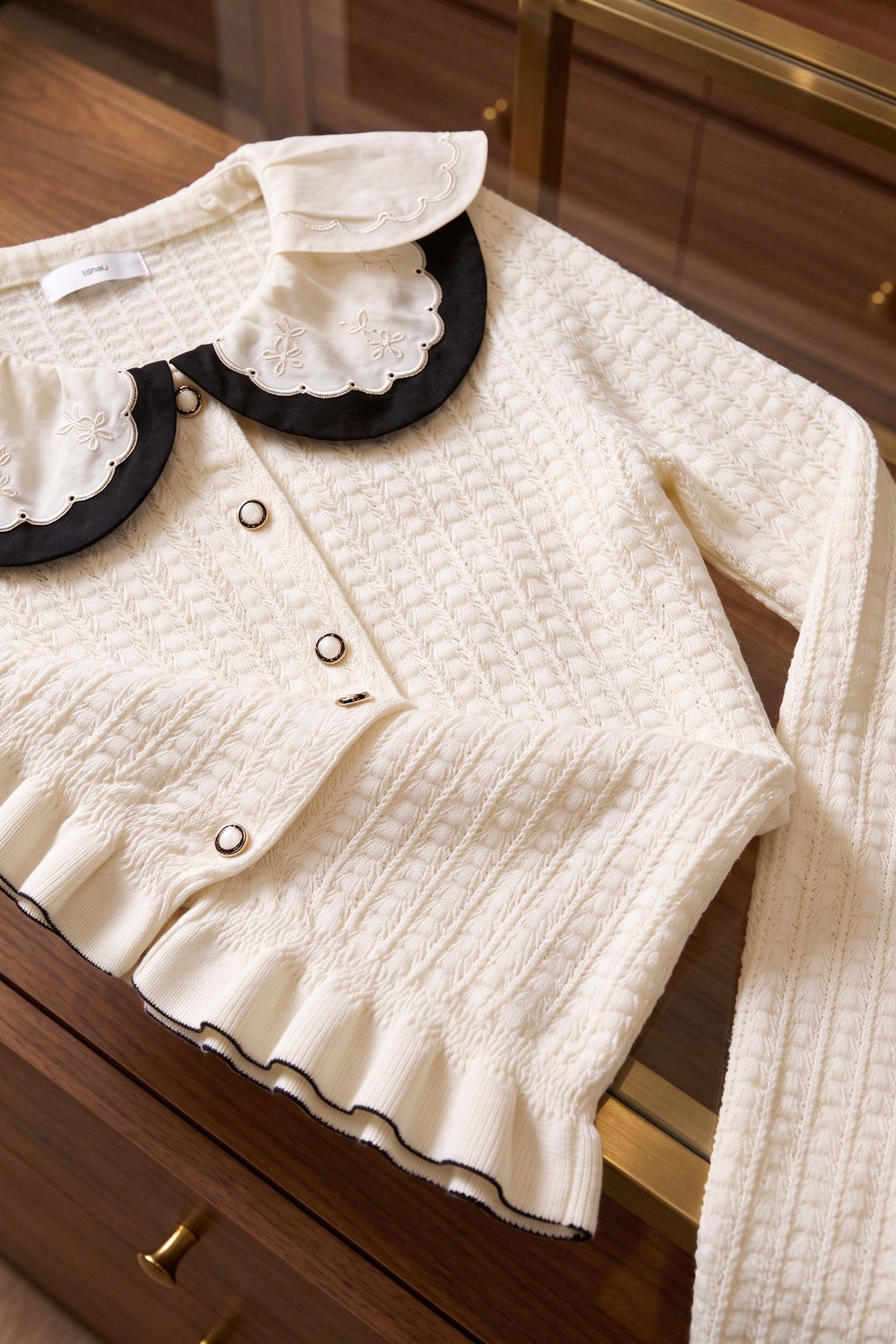 Off-White Textured Knit Fitted Peplum Cardigan