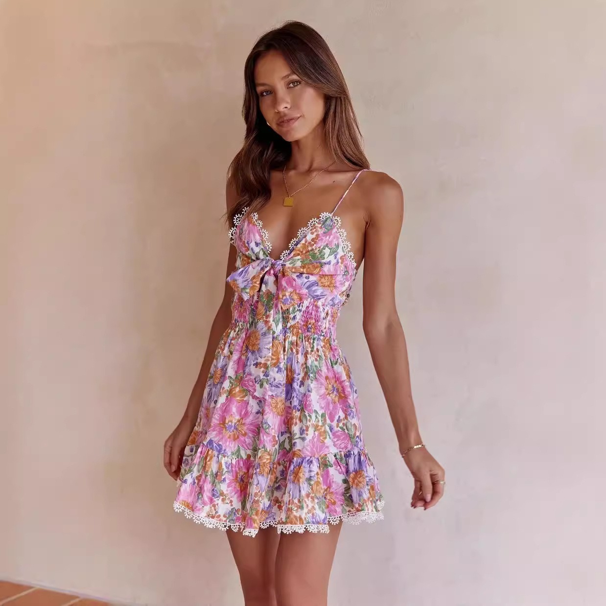 V-neck sexy camisole dress with cinched waist for slimming effect, bow printed skirt-chiquechics