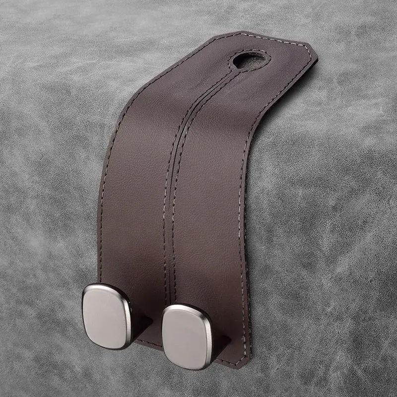 Single chestnut brown leather car seat hook designed for BMW front seats