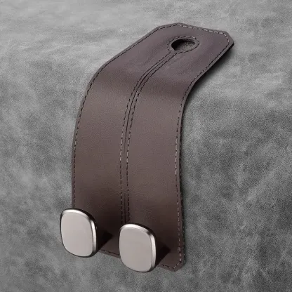 Single chestnut brown leather car seat hook designed for BMW front seats