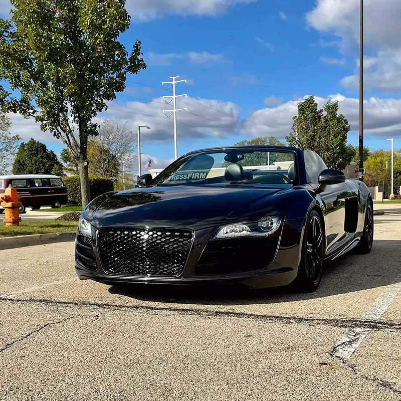 Honeycomb front grille installed on a pre-facelift Audi R8 Type 42