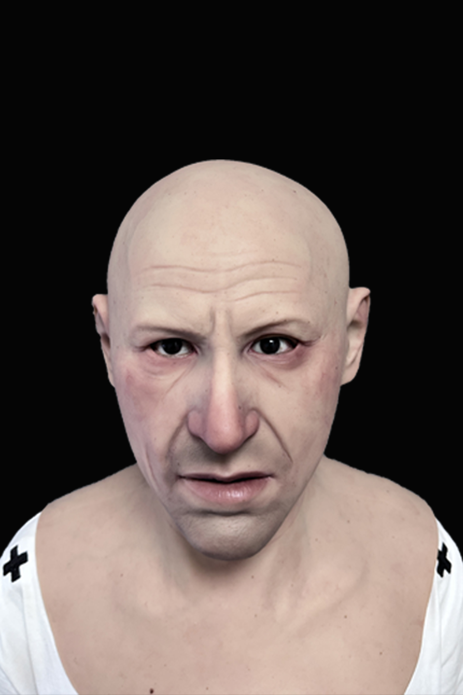 Bald elderly man silicone mask with realistic wrinkles and pale skin tone