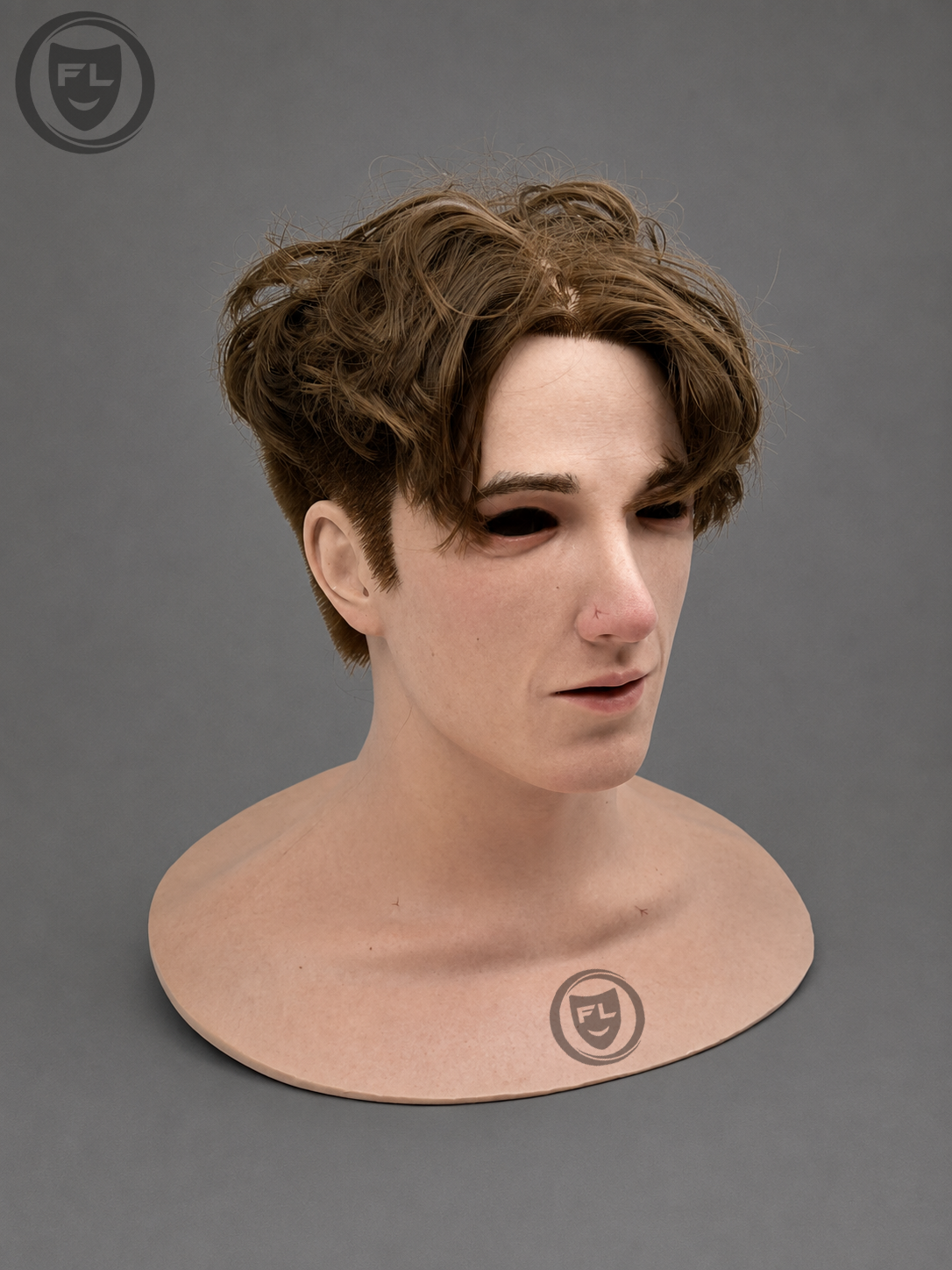 Young male silicone mask showing skin texture and brown hairstyle