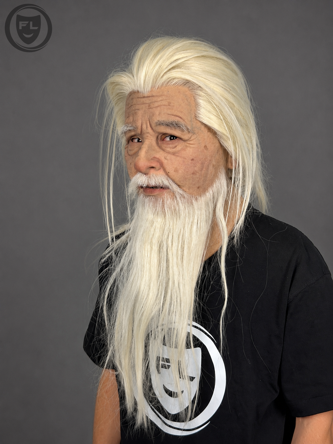 Realistic elderly sage mask with white hair and beard worn from side