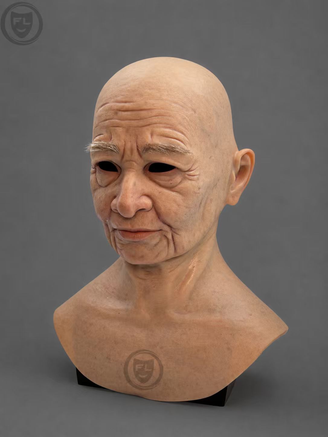 Realistic silicone mask of an elderly woman, with texture